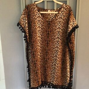 Leopard Bathing suit cover up with pom-poms.